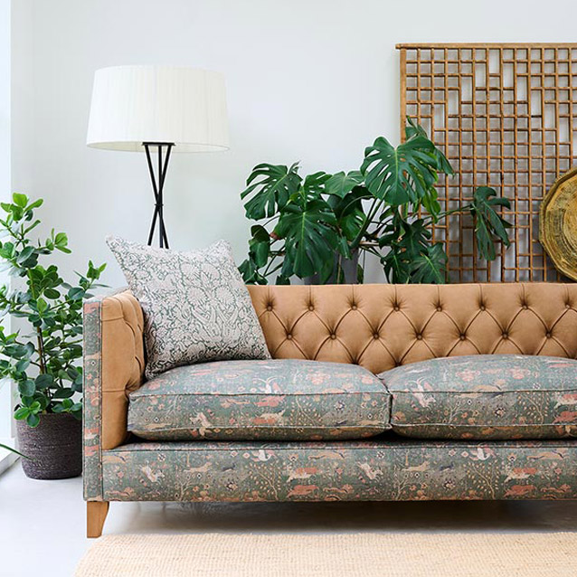 Haresfield 3 Seater Sofa in V&A Hunter and and Crest Leather Light Tan Lahore Dynasty Hunter and scatter in Threads of India Varanasi Wilderness